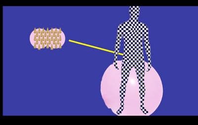 a woman is standing on a pink object