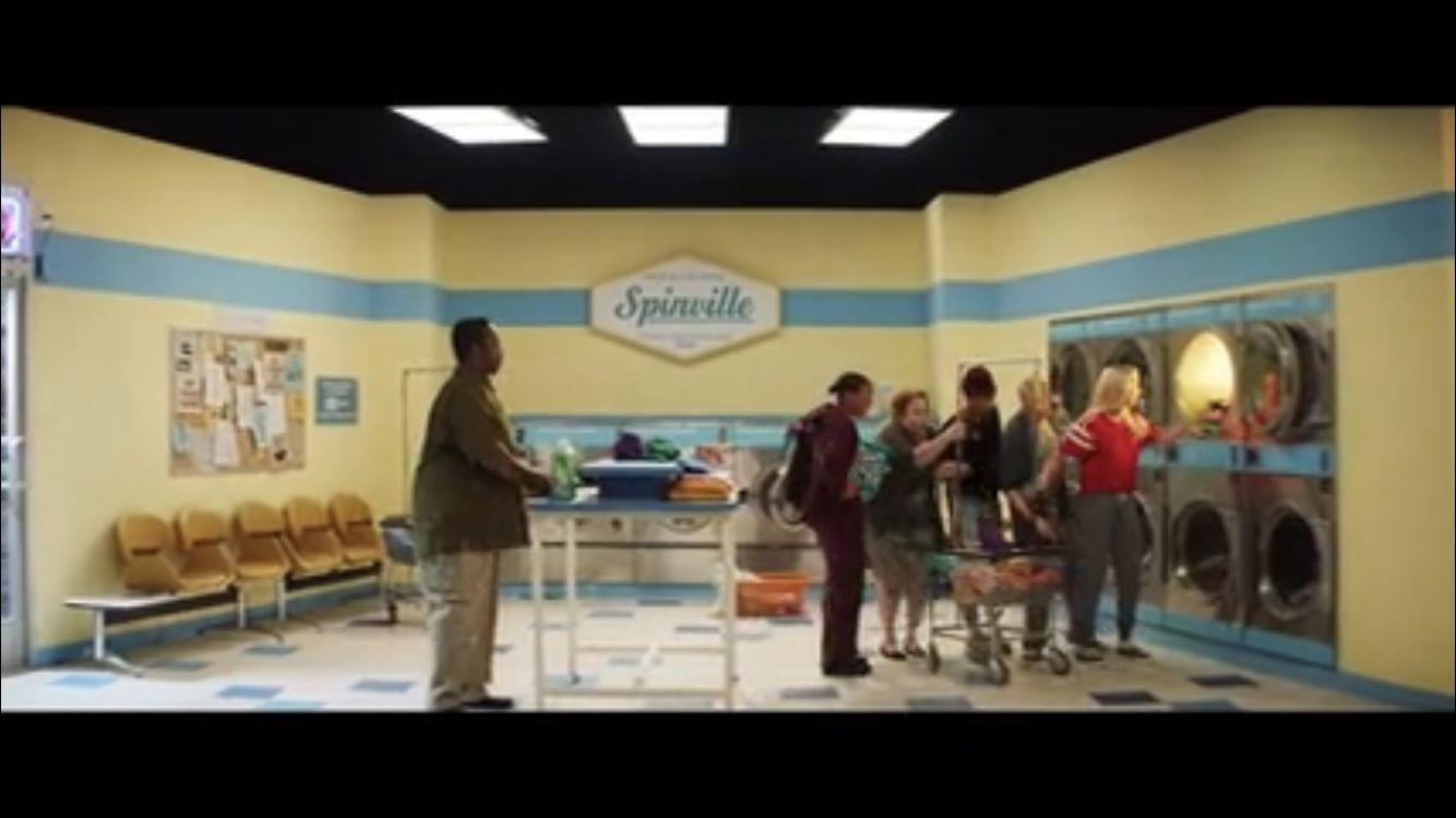 a group of people standing in a room
