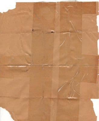 a piece of brown paper that has been torn off