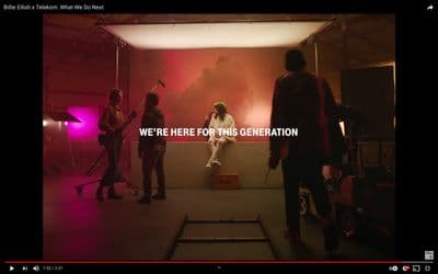 a group of people that are standing in a room