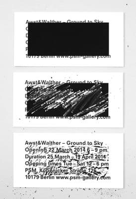 two black and white business cards with a black and white background