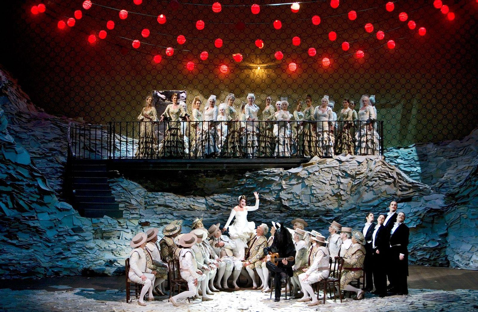 a group of people standing on top of a stage