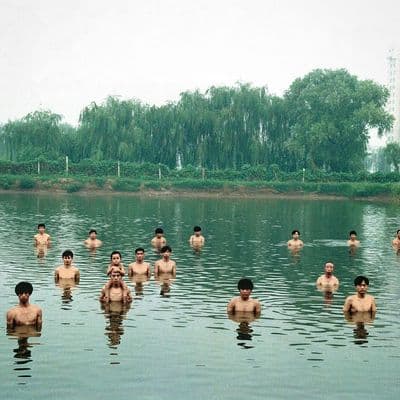 a group of people in a body of water