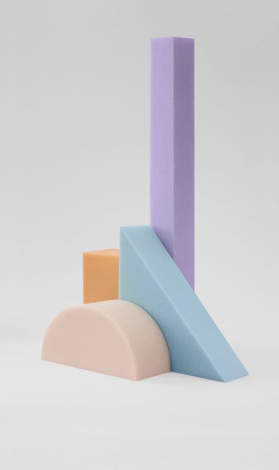 a stack of colored blocks sitting next to each other