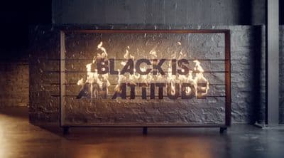 a sign that reads black is a beautiful attitude