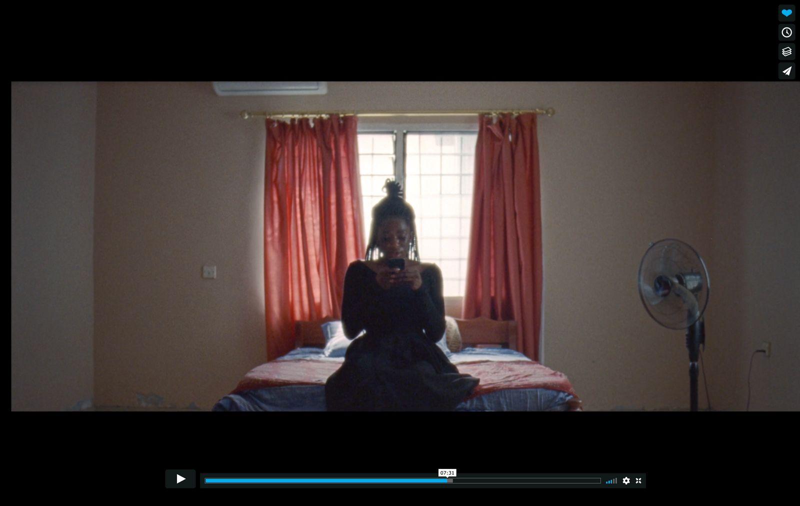 a woman taking a picture of herself in a mirror
