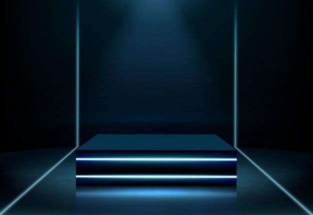 a dark room with a light coming from the ceiling