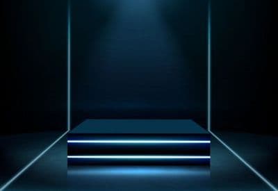 a dark room with a light coming from the ceiling