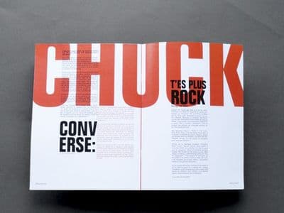 a magazine with a red and black cover