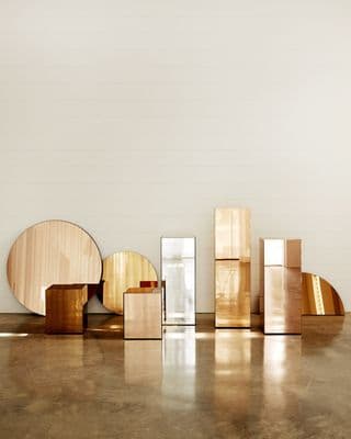 a group of mirrors sitting on top of a floor