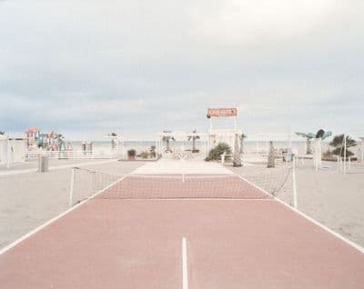 a tennis court with a net in the middle of it