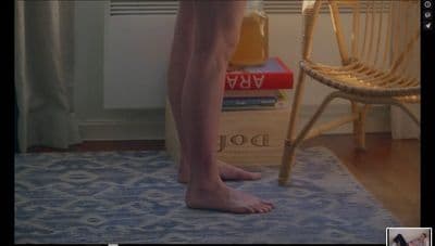 a person standing on a rug in a room
