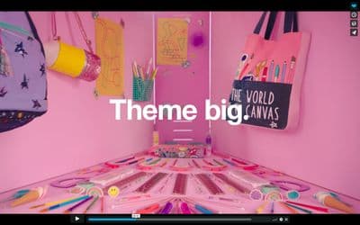 a pink room with a pink wall and a pink table