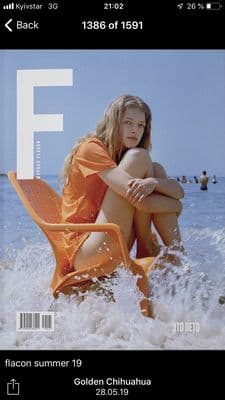 a magazine cover with a woman sitting on a beach chair