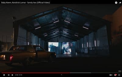 a truck is parked in front of a building