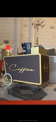 a cart that is sitting on a tile floor