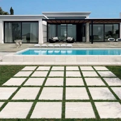 a modern house with a swimming pool in the yard