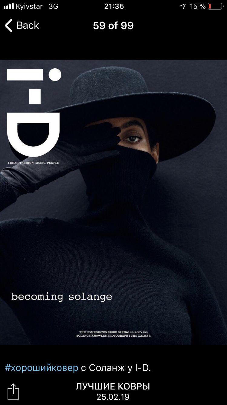 a woman wearing a black hat and a black sweater