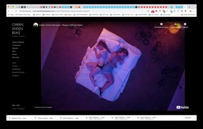 a couple of people that are laying in a bed