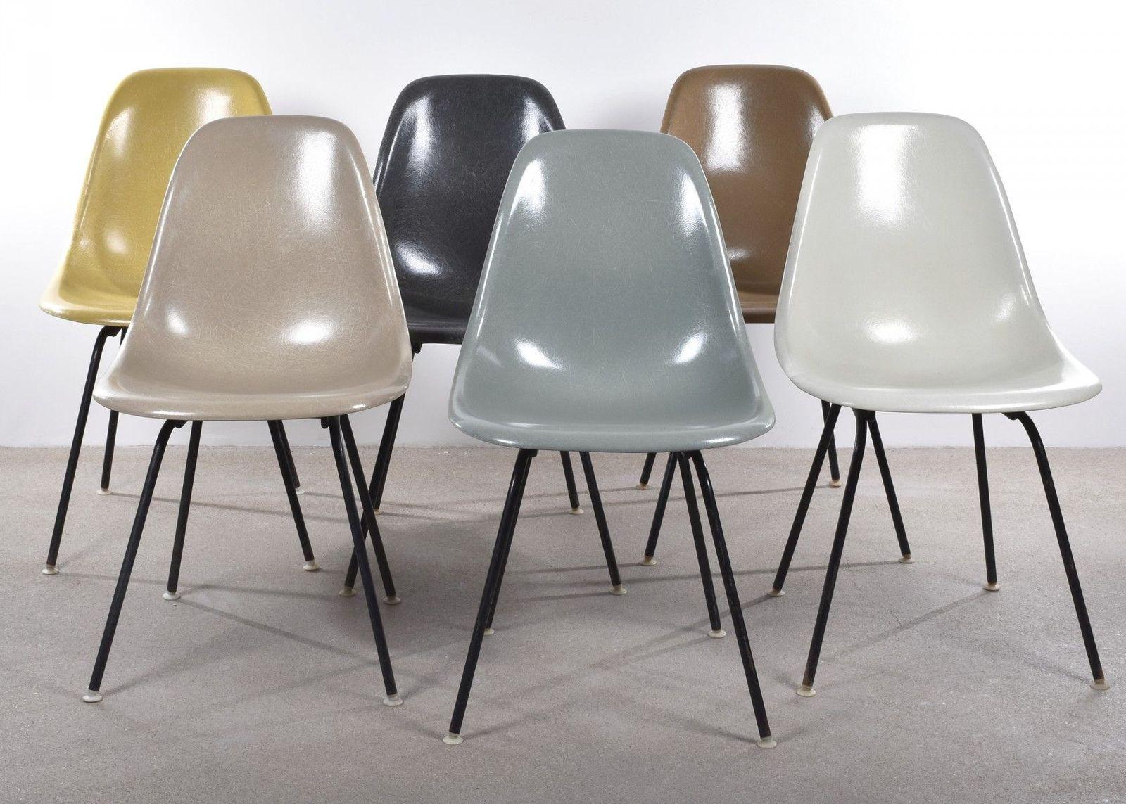 a group of chairs sitting next to each other