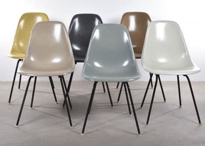 a group of chairs sitting next to each other