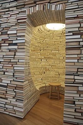 a room made out of stacks of books