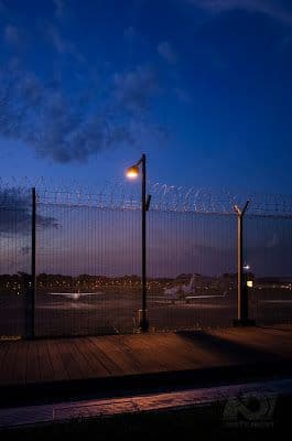 a fence that has a light on it