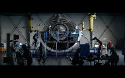 a group of people working on a large machine