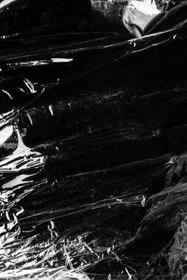 a black and white photo of foil wrapped in plastic