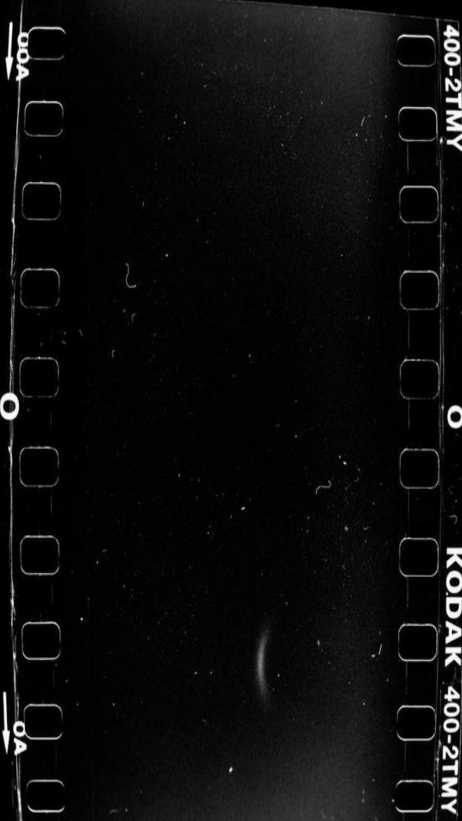 a black and white photo of a black and white film strip