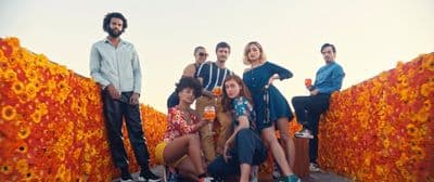 a group of people standing next to each other