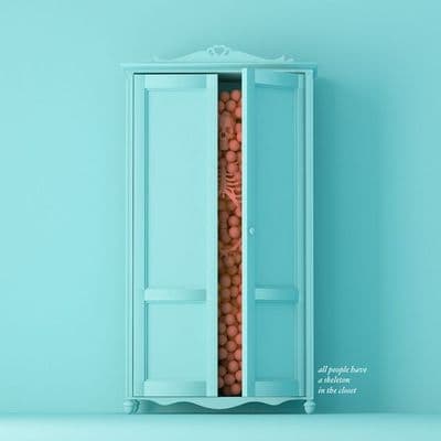 a blue cabinet with a bunch of balls in it
