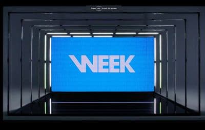 a blue screen with the word week written on it
