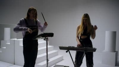 a couple of women standing next to each other