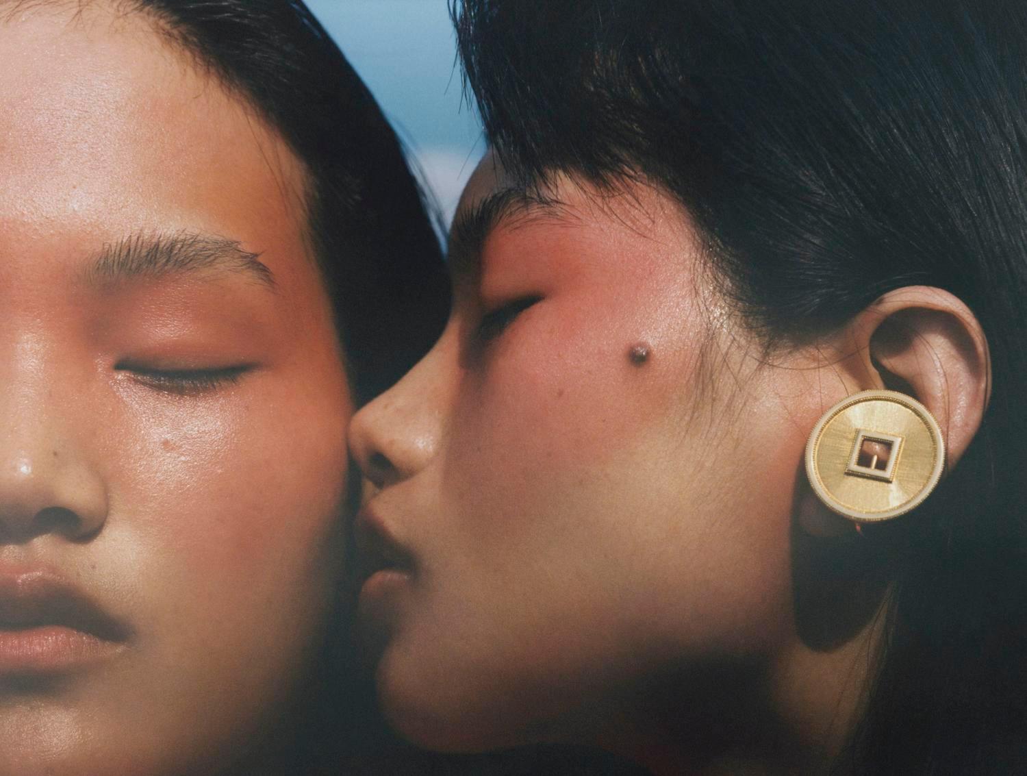 a couple of people that are kissing each other