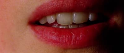 a close up of a person's mouth with teeth