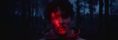a man with a red light on his face