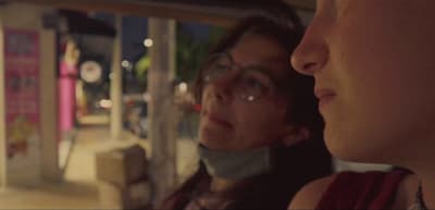 a couple of women standing next to each other