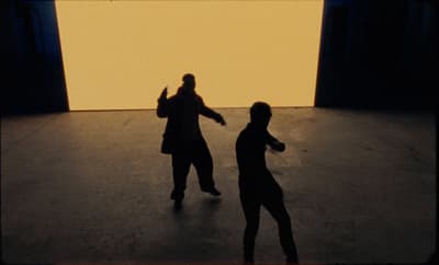 a couple of people that are standing in a room