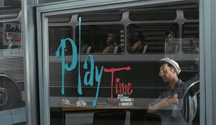 a man standing in front of a bus