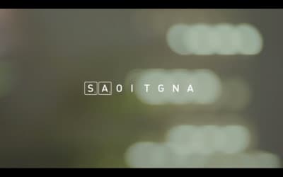 a blurry photo of the word saq tigna