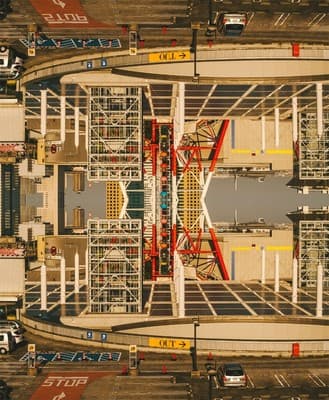 an aerial view of a bridge with traffic