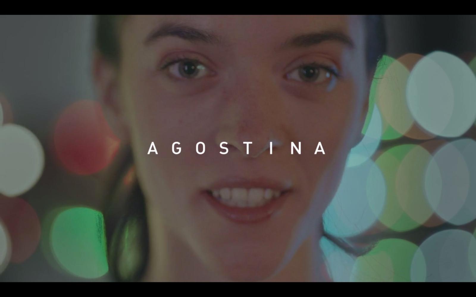a woman smiling with the words agostina in front of her
