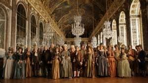 a large group of people standing in a room