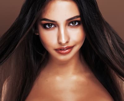 a close up of a woman with long hair