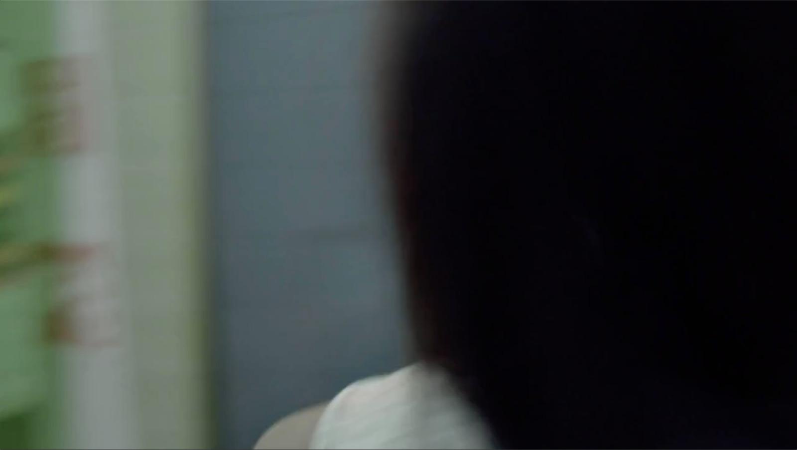 a close up of a person brushing their teeth