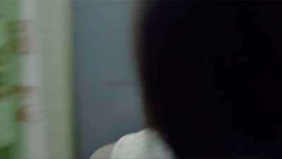 a close up of a person brushing their teeth