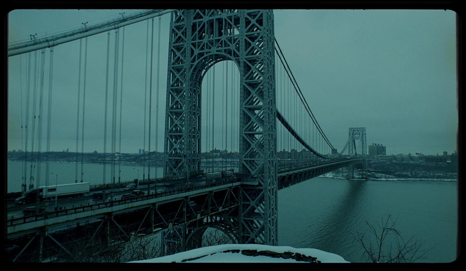 a view of a bridge over a body of water