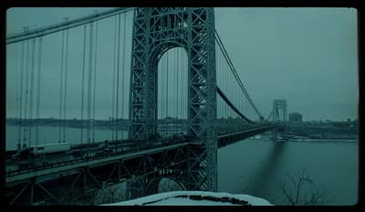 a view of a bridge over a body of water