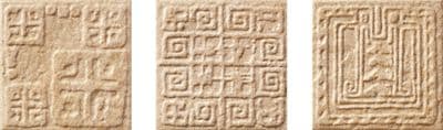 a set of three stone blocks with writing on them